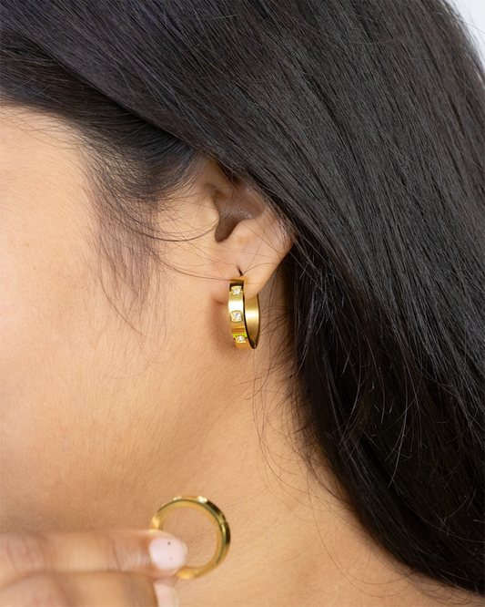  gold hoop earrings with small Diamonds