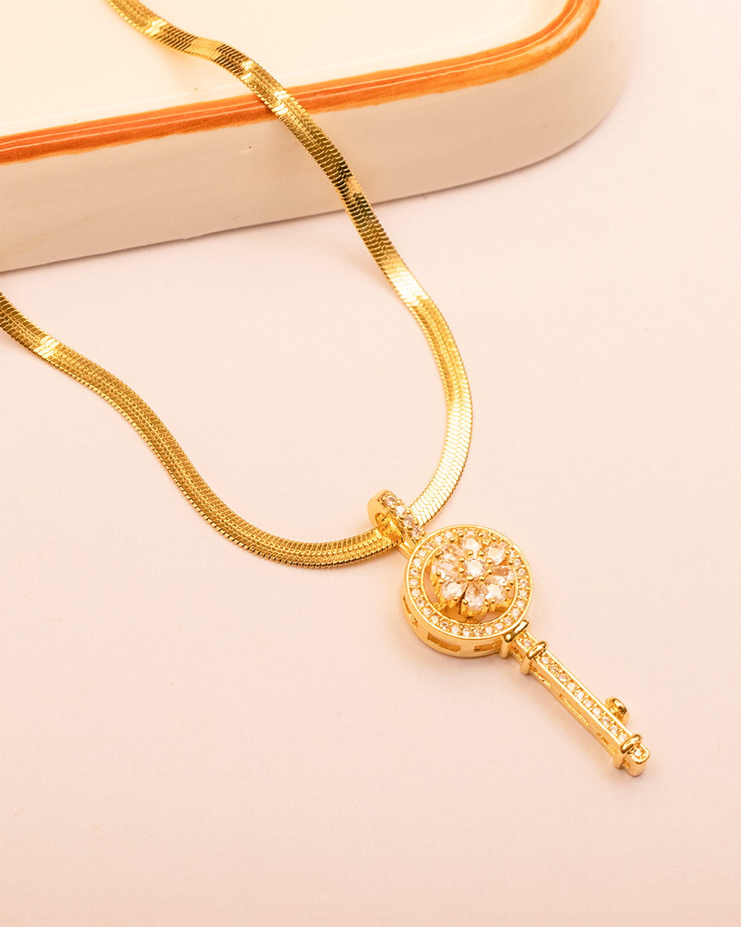 Gold necklace with a Beautiful Key Shape Pendant 